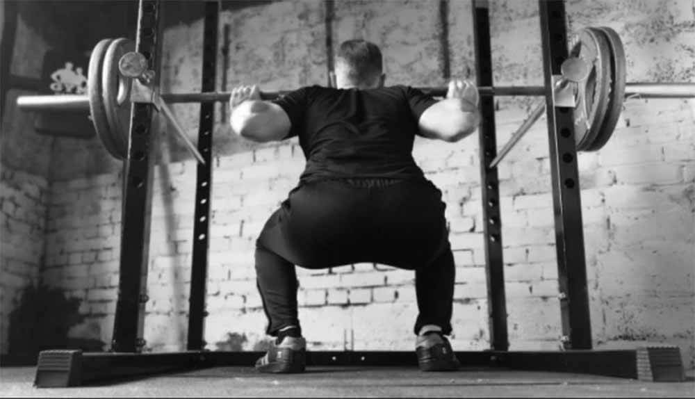 Colocación de las piernas para hacer una sentadilla